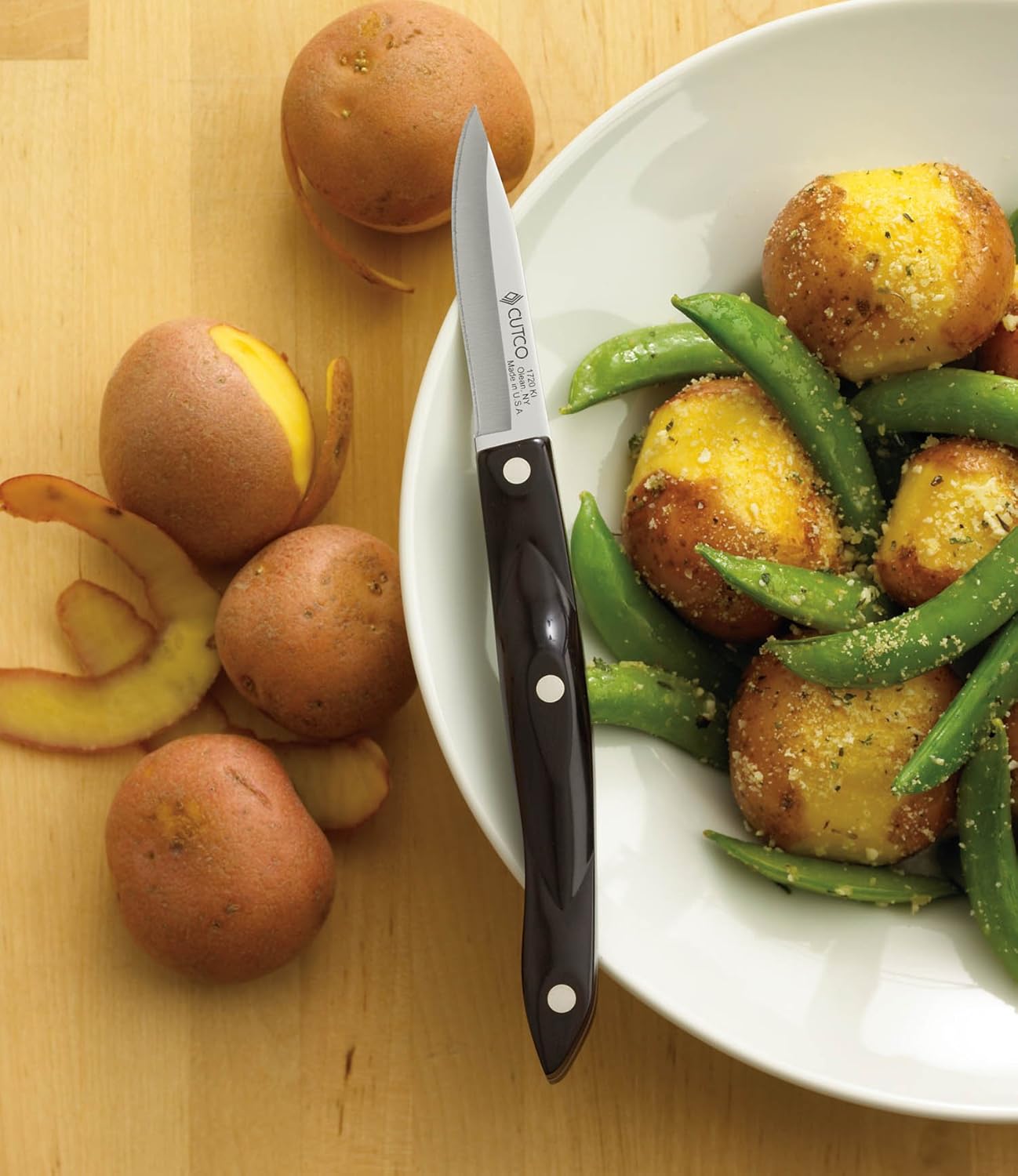 Model 1720 Paring Knife with 2¾" High Carbon Stainless blade and 5" classic dark brown handle (often called "black") in factory-sealed plastic bag.