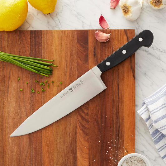 Classic 8-Inch Chef Knife, Razor-Sharp, German Engineered | Fully Forged Construction Provides Balance with Traditional Triple-Rivet Handles Enables Comfortable Easy Cutting.