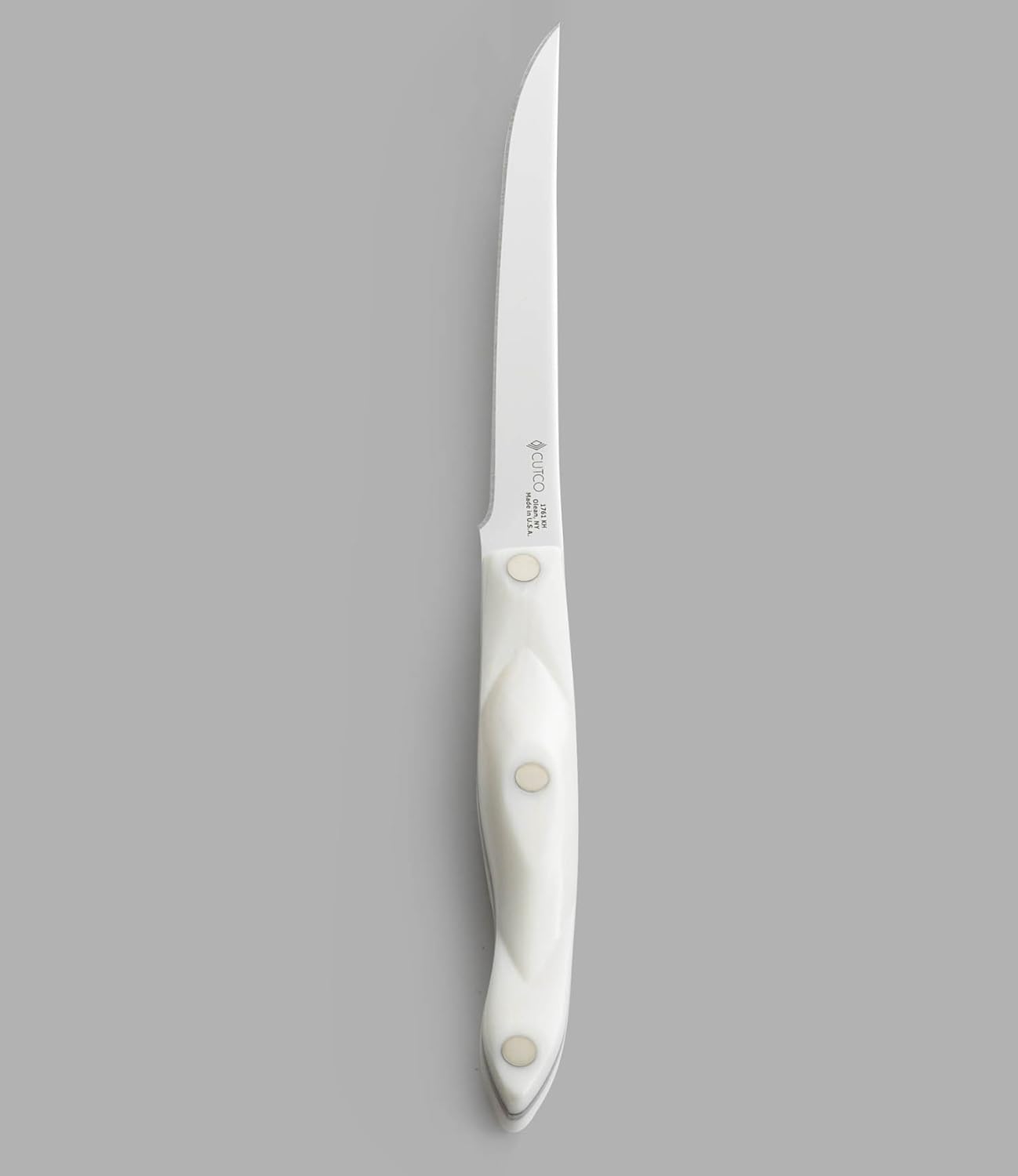 Model 1761 White (Pearl) Boning Knife with High Carbon Stainless 6.1" Straight edge blade and 5.5" handle in factory-sealed plastic bag.