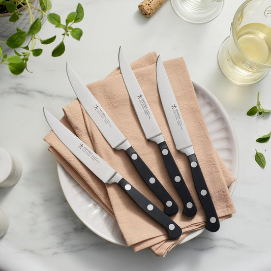Classic Steak Knives Set of 4, Razor-Sharp, German Engineered | Fully Forged Construction Provides Balance with Traditional Triple-Rivet Handles Enables Comfortable Easy Cutting.