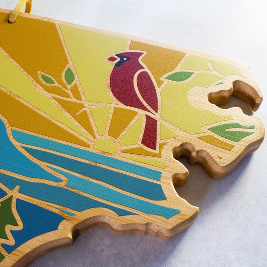 North Carolina State Shaped Cutting Board, Summer Stokes Art | State charcuterie board with colorful hand-drawn landscape art. Smooth reverse side for food prep. Hang tie for wall display. - Colors A