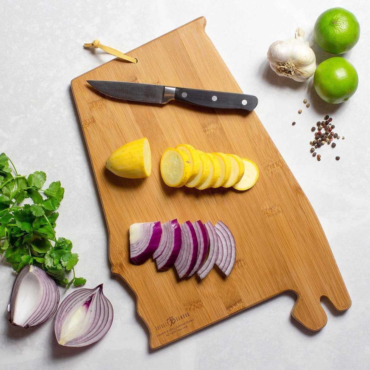 North Carolina State Shaped Cutting Board, Summer Stokes Art | State charcuterie board with colorful hand-drawn landscape art. Smooth reverse side for food prep. Hang tie for wall display. - Colors A