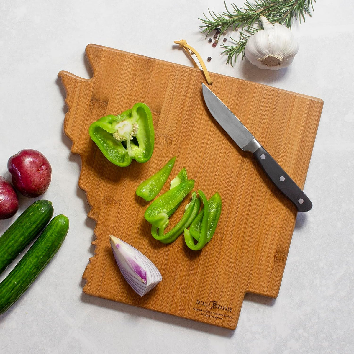 North Carolina State Shaped Cutting Board, Summer Stokes Art | State charcuterie board with colorful hand-drawn landscape art. Smooth reverse side for food prep. Hang tie for wall display. - Colors A