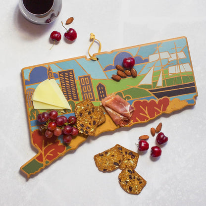 North Carolina State Shaped Cutting Board, Summer Stokes Art | State charcuterie board with colorful hand-drawn landscape art. Smooth reverse side for food prep. Hang tie for wall display. - Colors A