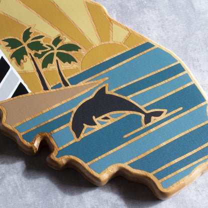 North Carolina State Shaped Cutting Board, Summer Stokes Art | State charcuterie board with colorful hand-drawn landscape art. Smooth reverse side for food prep. Hang tie for wall display. - Colors A