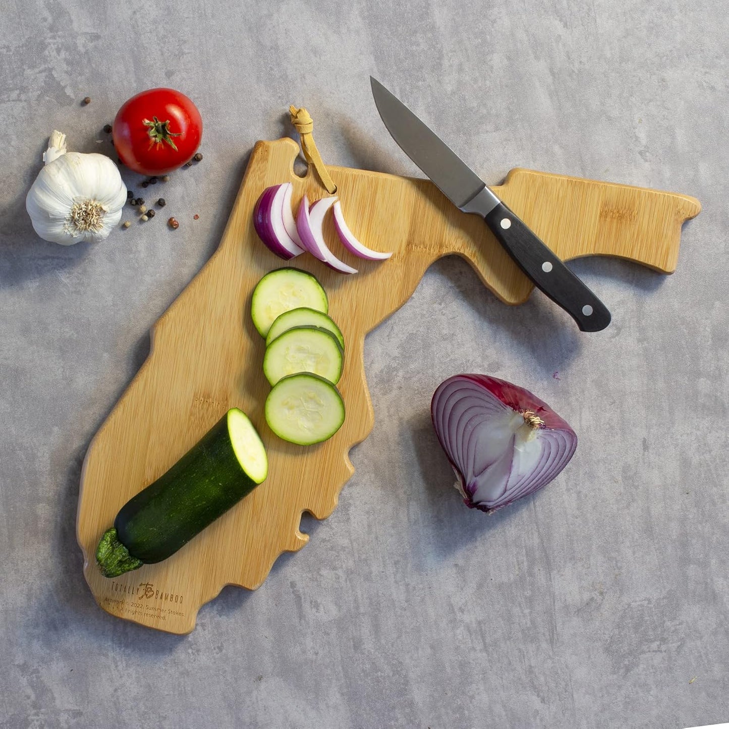 North Carolina State Shaped Cutting Board, Summer Stokes Art | State charcuterie board with colorful hand-drawn landscape art. Smooth reverse side for food prep. Hang tie for wall display. - Colors A