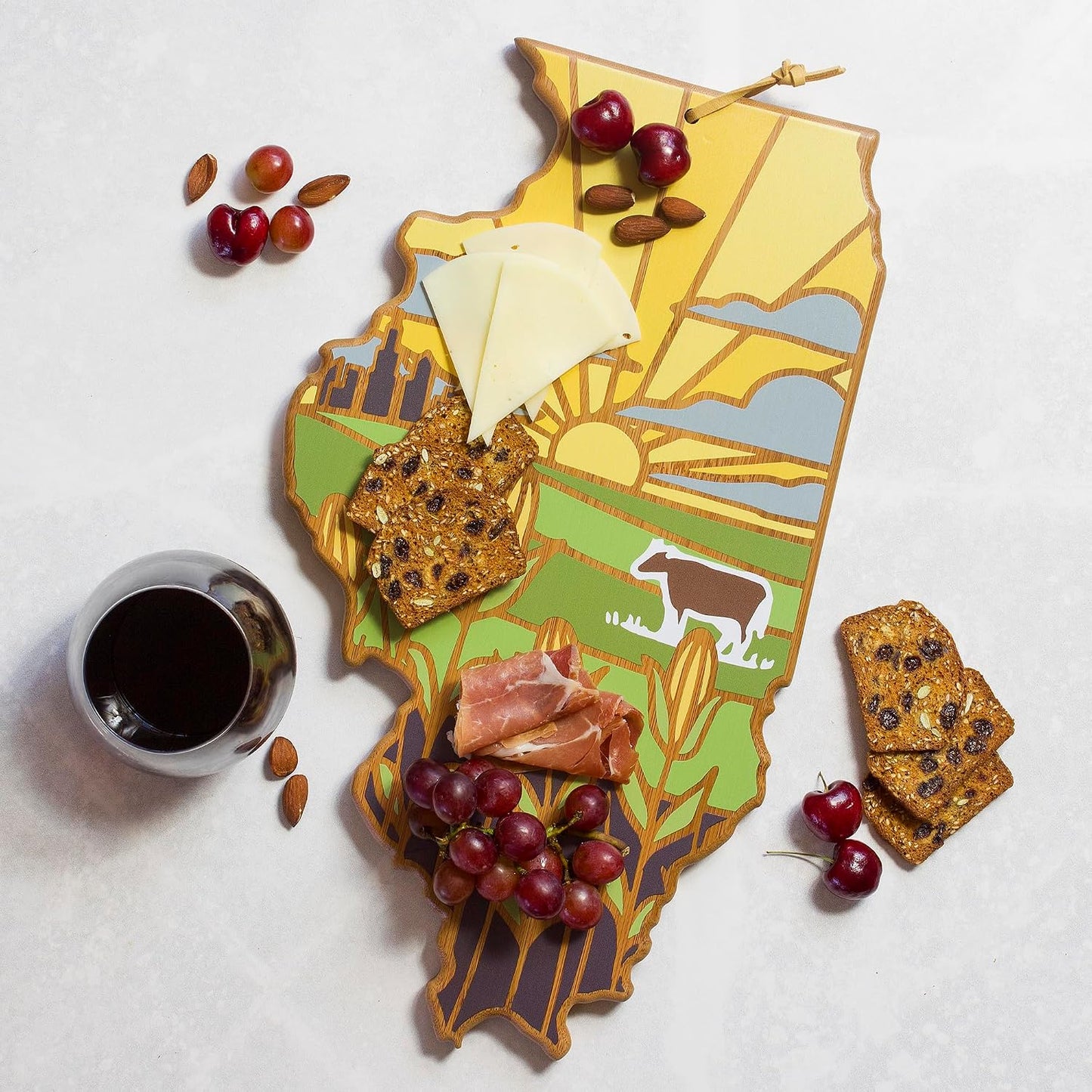 North Carolina State Shaped Cutting Board, Summer Stokes Art | State charcuterie board with colorful hand-drawn landscape art. Smooth reverse side for food prep. Hang tie for wall display. - Colors A