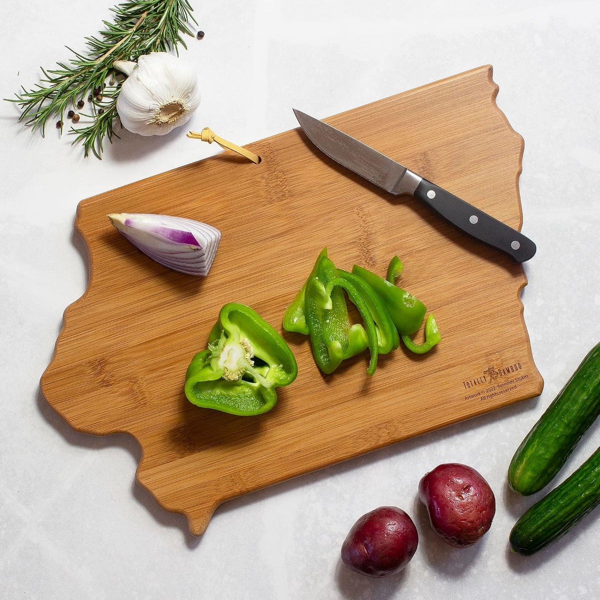 North Carolina State Shaped Cutting Board, Summer Stokes Art | State charcuterie board with colorful hand-drawn landscape art. Smooth reverse side for food prep. Hang tie for wall display. - Colors A