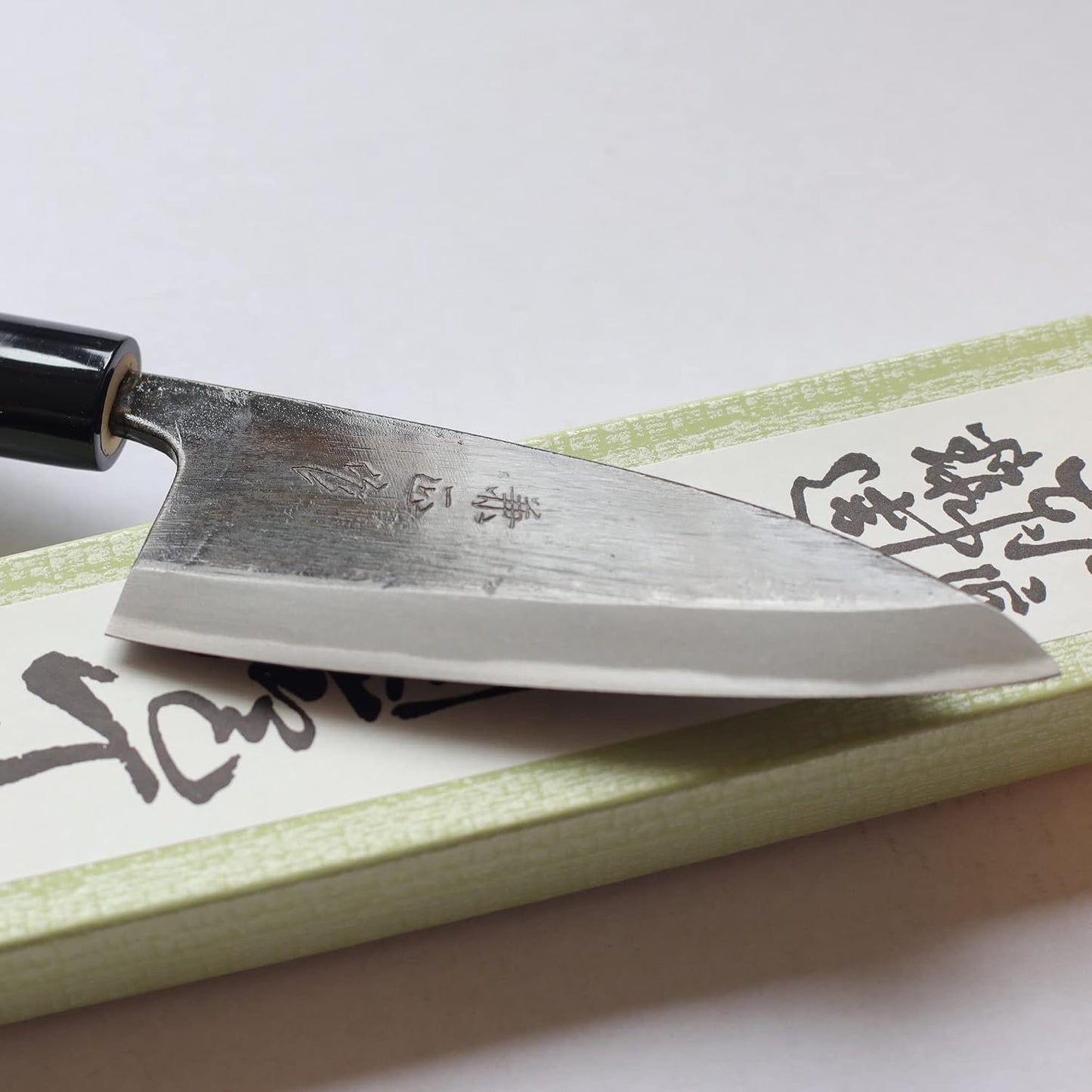 Kanetsune Usu-Deba 120mm With Plastic Bolster Magnolia wood handle,"Kuro-Uchi" finished KC-553