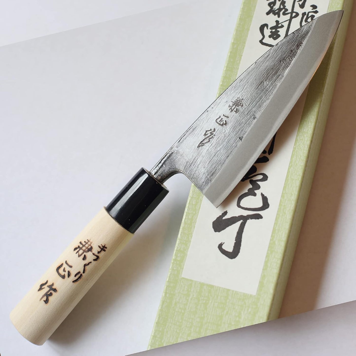Kanetsune Usu-Deba 120mm With Plastic Bolster Magnolia wood handle,"Kuro-Uchi" finished KC-553
