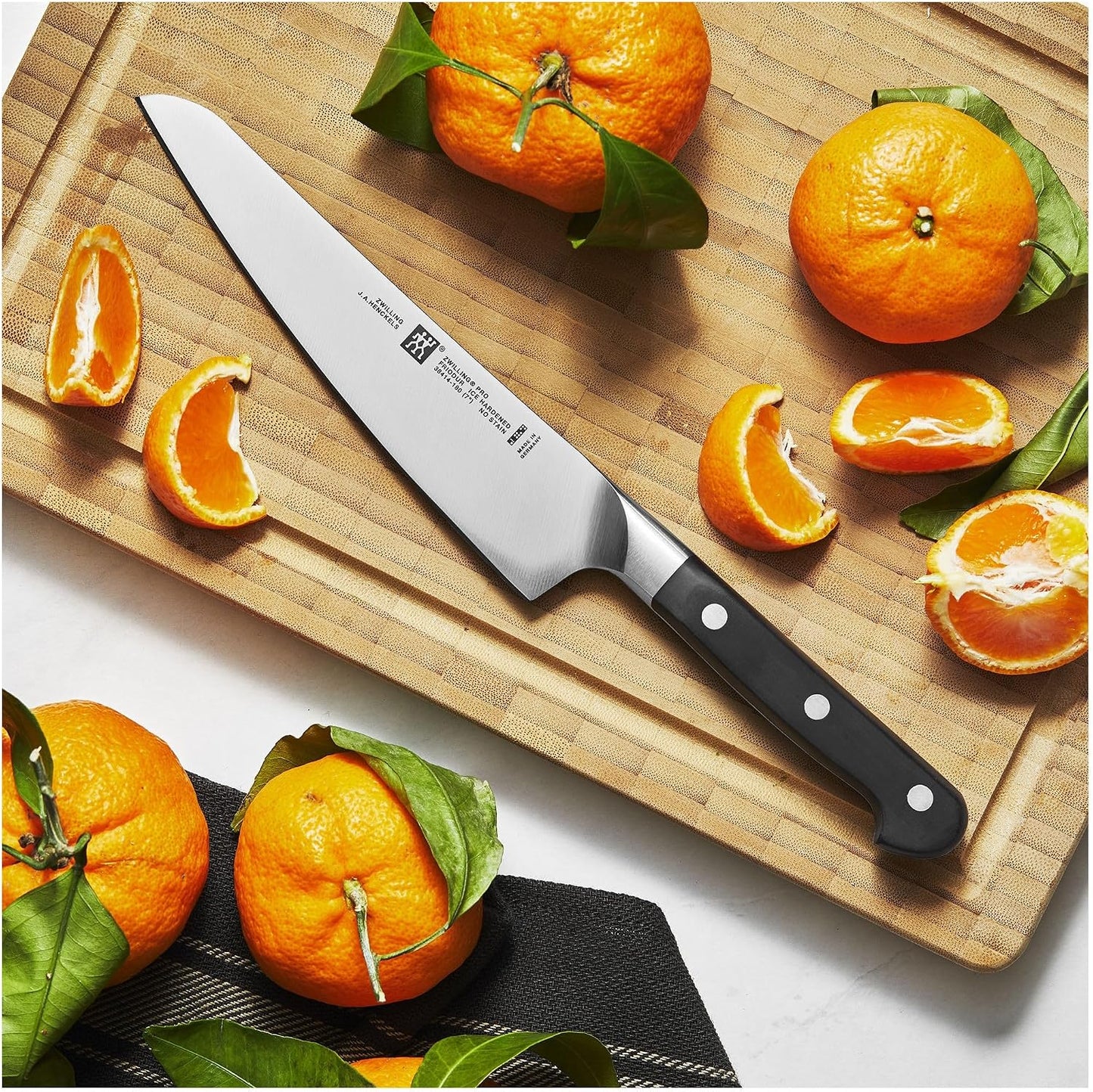 Twin Signature 7-inch Razor-Sharp German Hollow Edge Santoku Knife, Made in Company-Owned German Factory with Special Formula Steel perfected for almost 300 Years, Dishwasher Safe
