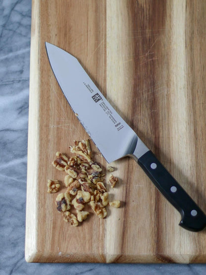 Twin Signature 7-inch Razor-Sharp German Hollow Edge Santoku Knife, Made in Company-Owned German Factory with Special Formula Steel perfected for almost 300 Years, Dishwasher Safe