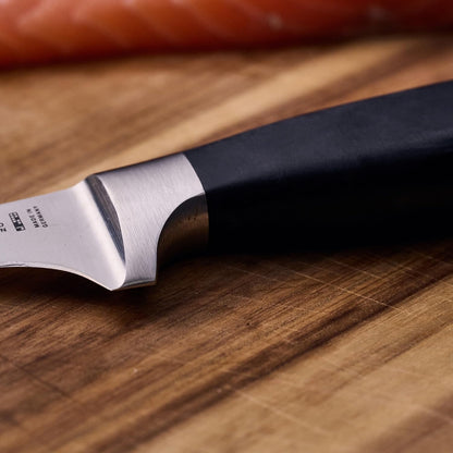 ZWILLING Four Star 5.5-inch Razor-Sharp German High Carbon Stainless Steel Boning Knife, Made in Company-Owned German Factory with Special Formula Steel perfected for almost 300 Years, Dishwasher Safe