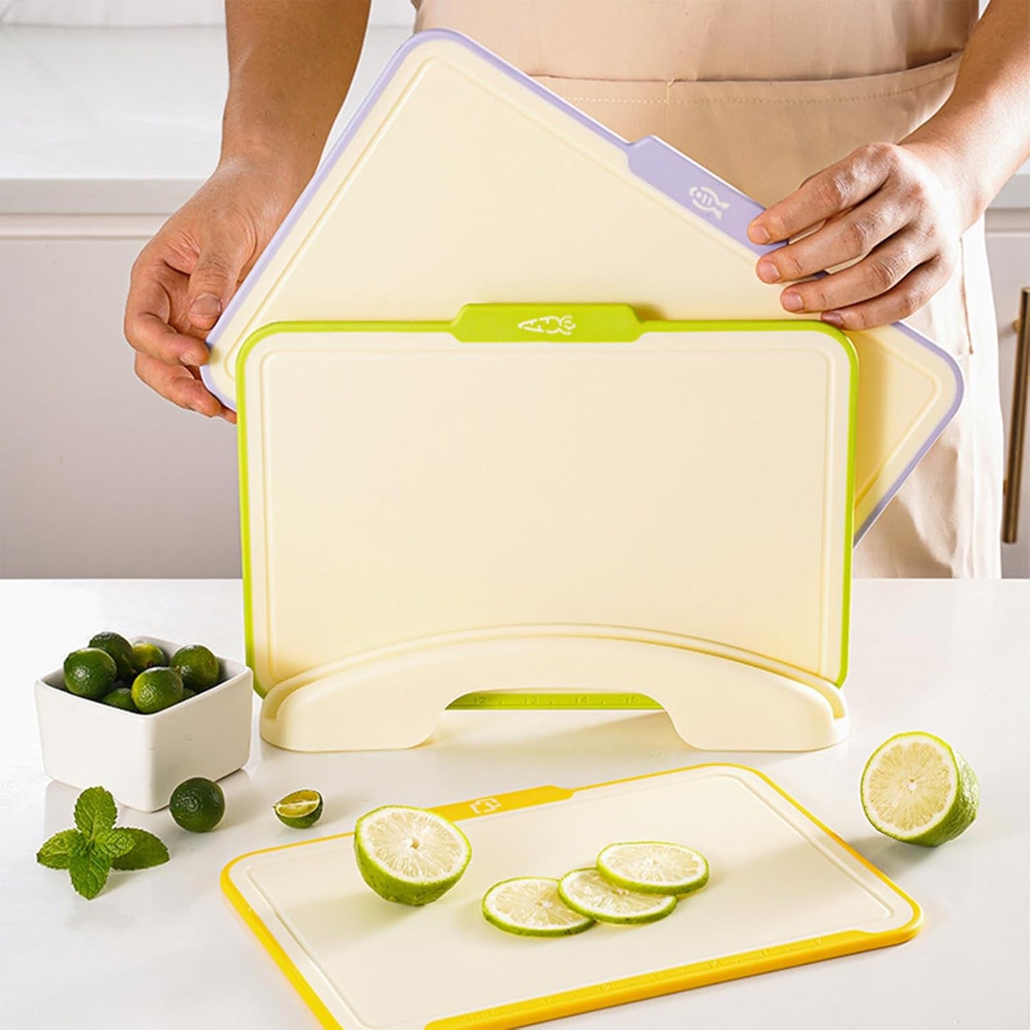 Plastic Cutting Boards for Kitchen, 4-Pieces Cutting Board With Food Icons And Storage Stand, Easy Grip Handle, Professional Chopping Board Set for Meat, Veggies, Fruits（12.9"X 9.4" X 3.1")