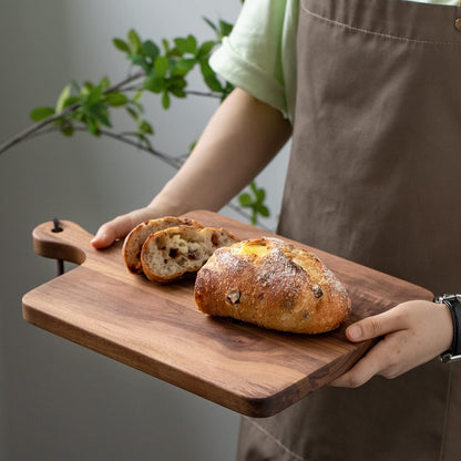 Muso Wood Small Cutting Board with Handle, Walnut Wooden Chopping Boards for Bread, Vegetables & Fruits, Dinner Cheese Board with Hole(15.2x7.3 Inches)