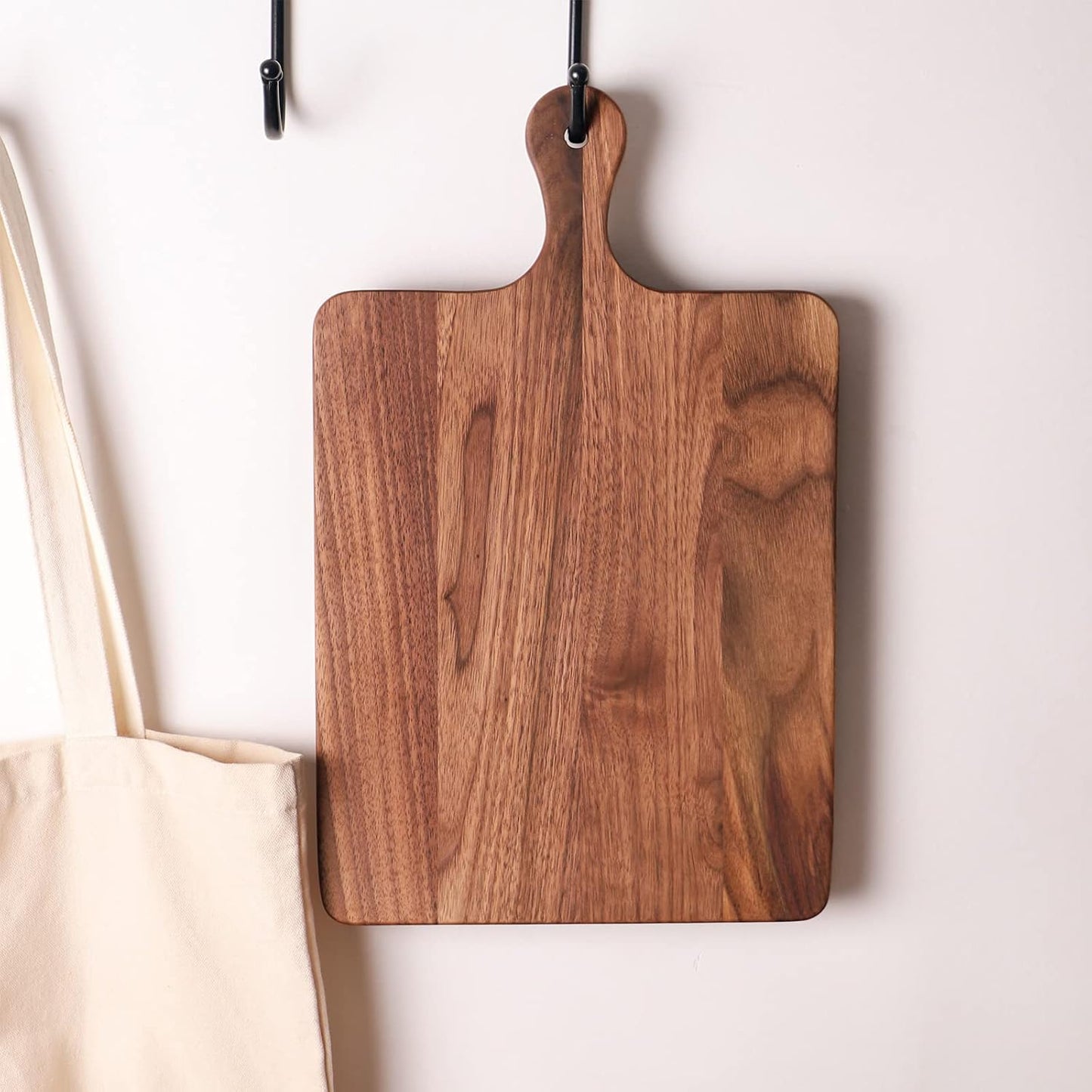 Muso Wood Small Cutting Board with Handle, Walnut Wooden Chopping Boards for Bread, Vegetables & Fruits, Dinner Cheese Board with Hole(15.2x7.3 Inches)