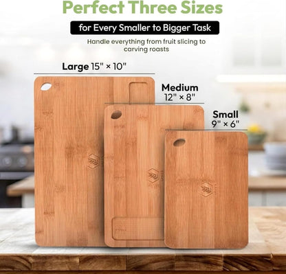 Greva 3 Piece Bamboo Cutting Board Set with Juice Grooves, Non-Slip Feet Built-in Handles, Deep Carbonized Wood for Meat Fruit and Cheese Includes 3-in-1 Wooden Cutlery Set