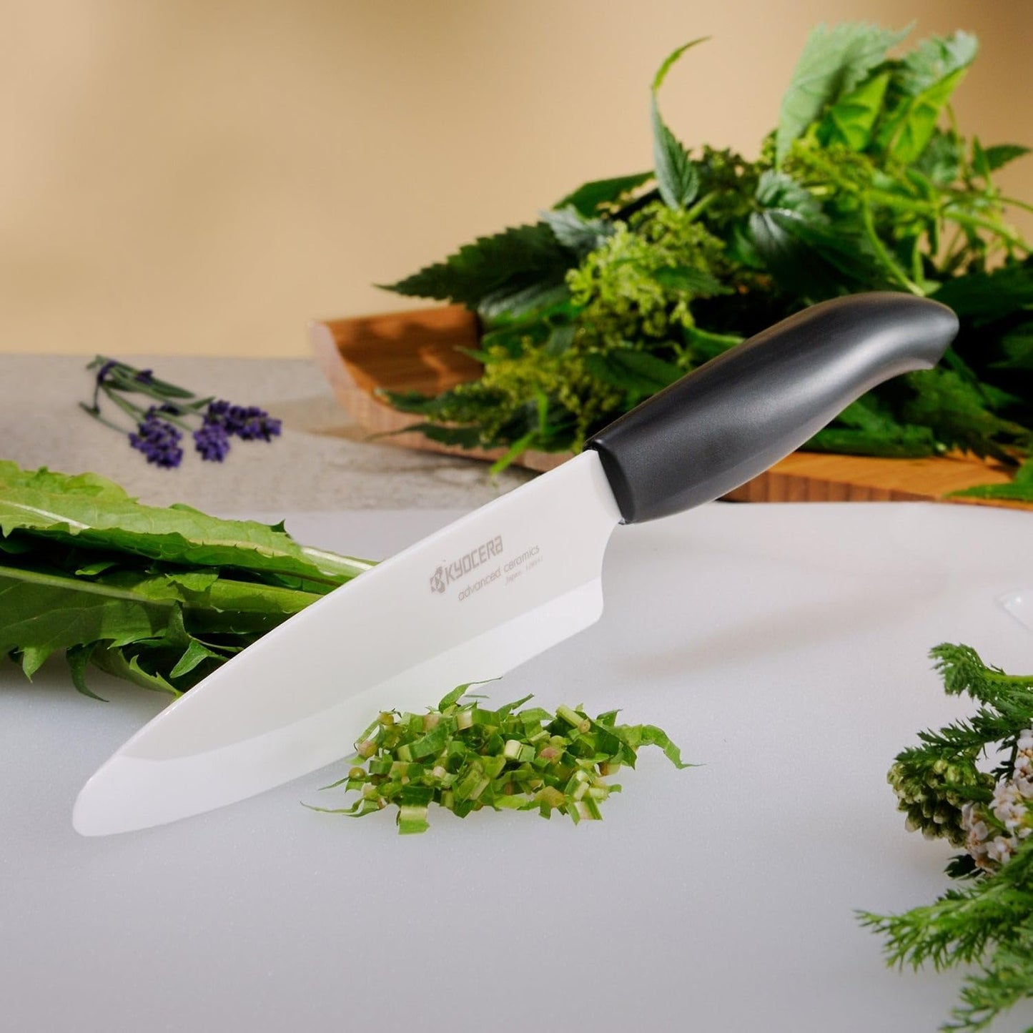 Kyocera Advanced Ceramic Revolution Series 6-inch Nakiri Vegetable Cleaver, Black Handle, White Blade