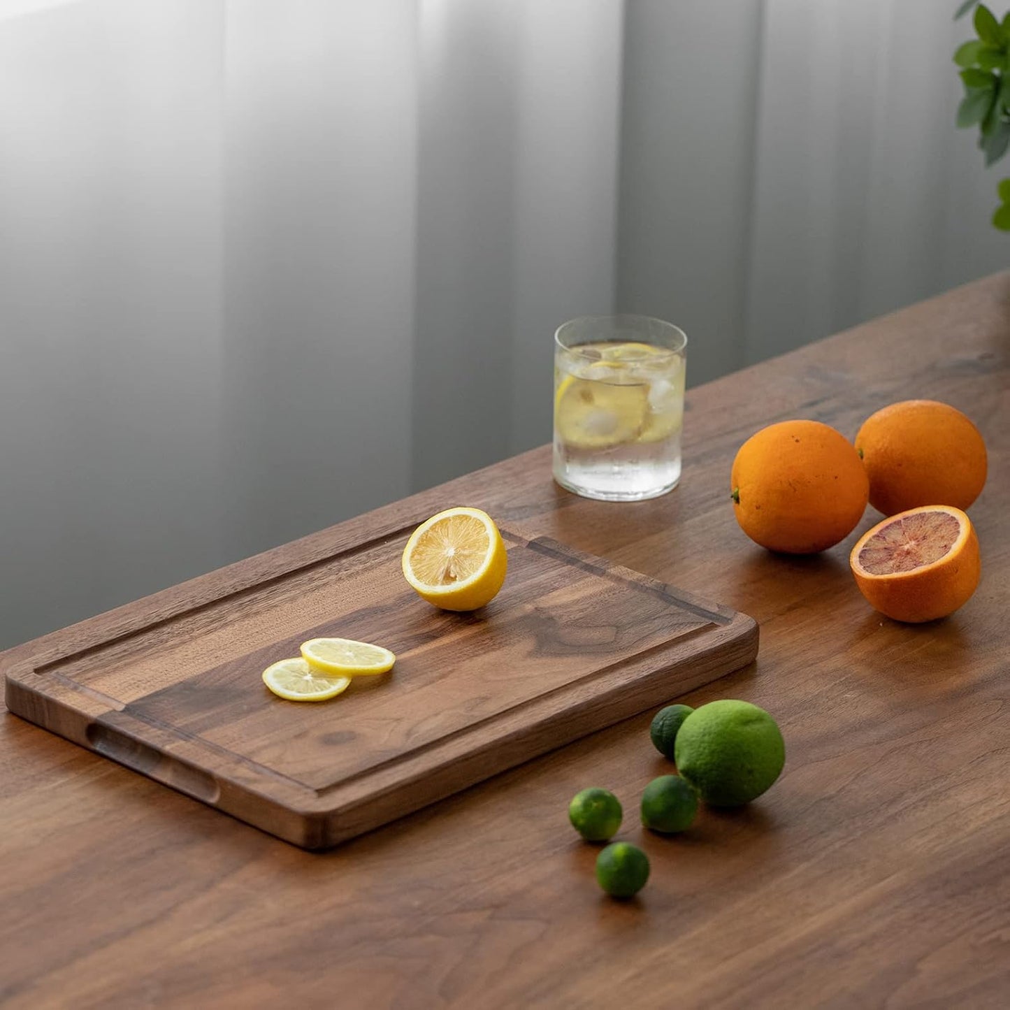 Muso Wood Small Cutting Board with Handle, Walnut Wooden Chopping Boards for Bread, Vegetables & Fruits, Dinner Cheese Board with Hole(15.2x7.3 Inches)