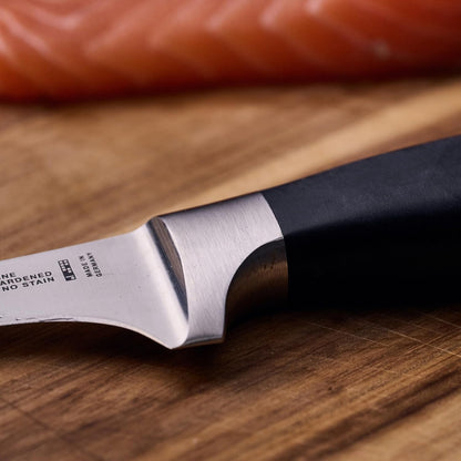 ZWILLING Four Star 5.5-inch Razor-Sharp German High Carbon Stainless Steel Boning Knife, Made in Company-Owned German Factory with Special Formula Steel perfected for almost 300 Years, Dishwasher Safe