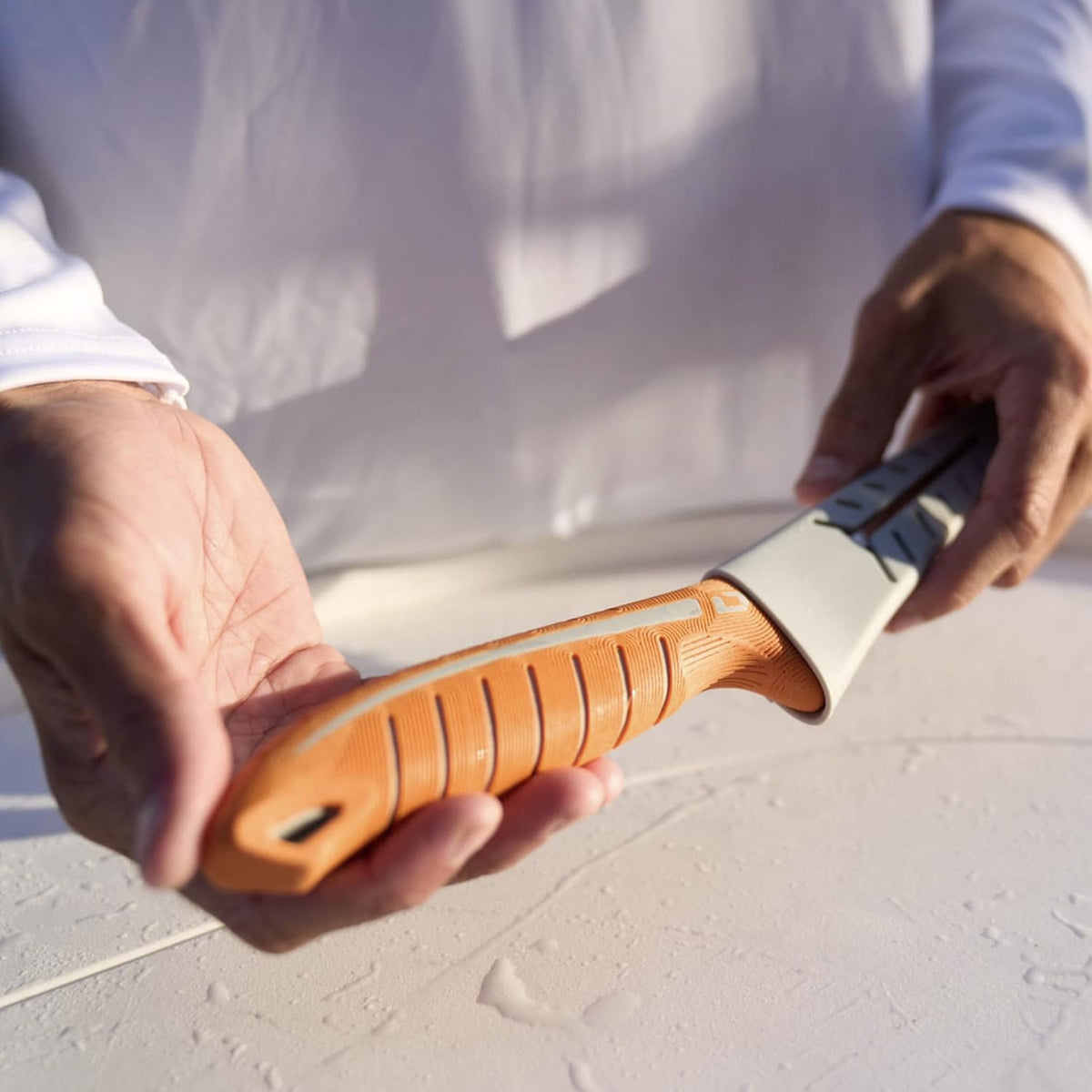 Dextreme Dual Edge 8" Flexible Fillet Knife, Sheath | Flexible dual edge high-carbon stainless blade glides along bones. Protective sheath included for boat and kitchen use.