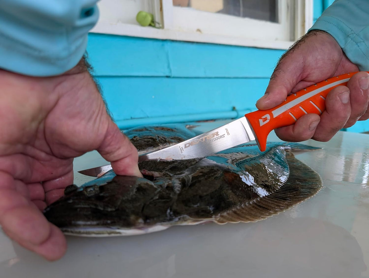 Dextreme Dual Edge 8" Flexible Fillet Knife, Sheath | Flexible dual edge high-carbon stainless blade glides along bones. Protective sheath included for boat and kitchen use.