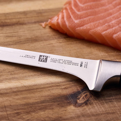 ZWILLING Four Star 5.5-inch Razor-Sharp German High Carbon Stainless Steel Boning Knife, Made in Company-Owned German Factory with Special Formula Steel perfected for almost 300 Years, Dishwasher Safe