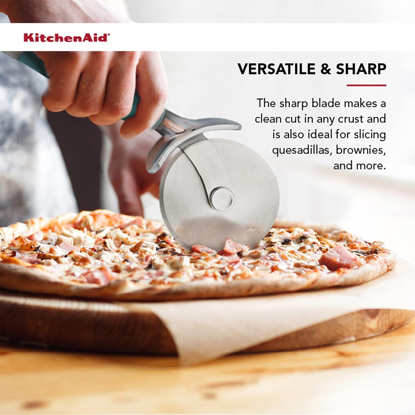 KitchenAid Gourmet Stainless Steel Pizza Wheel with Sharp Blade to Easily Cutting Pizza Crusts, Pies, and more, Finger Guard for Safety and Comfort Grip to Protect Fingers, Dishwasher Safe, Black