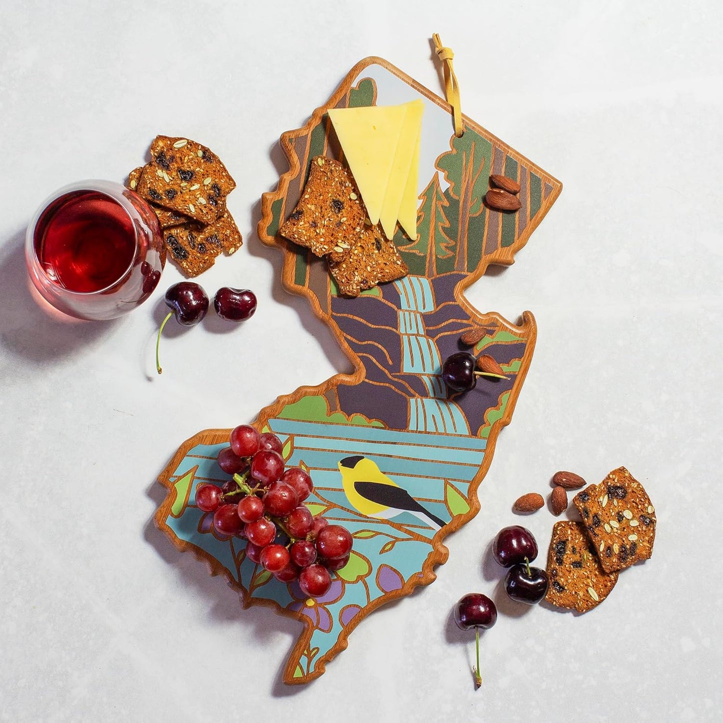 Totally Bamboo North Carolina State Shaped Cutting Board and Charcuterie Serving Platter with Artwork by Summer Stokes, Includes Hang Tie for Wall Display 18" x 8" x 5/8" - Colors A