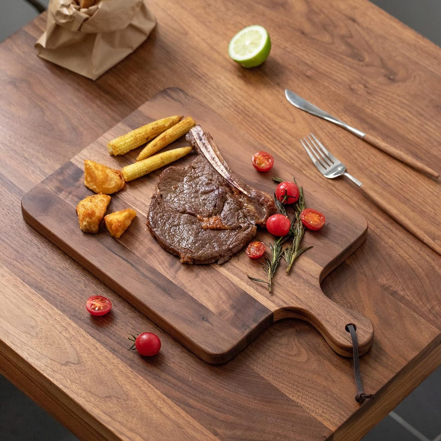 Muso Wood Small Cutting Board with Handle, Walnut Wooden Chopping Boards for Bread, Vegetables & Fruits, Dinner Cheese Board with Hole(15.2x7.3 Inches)