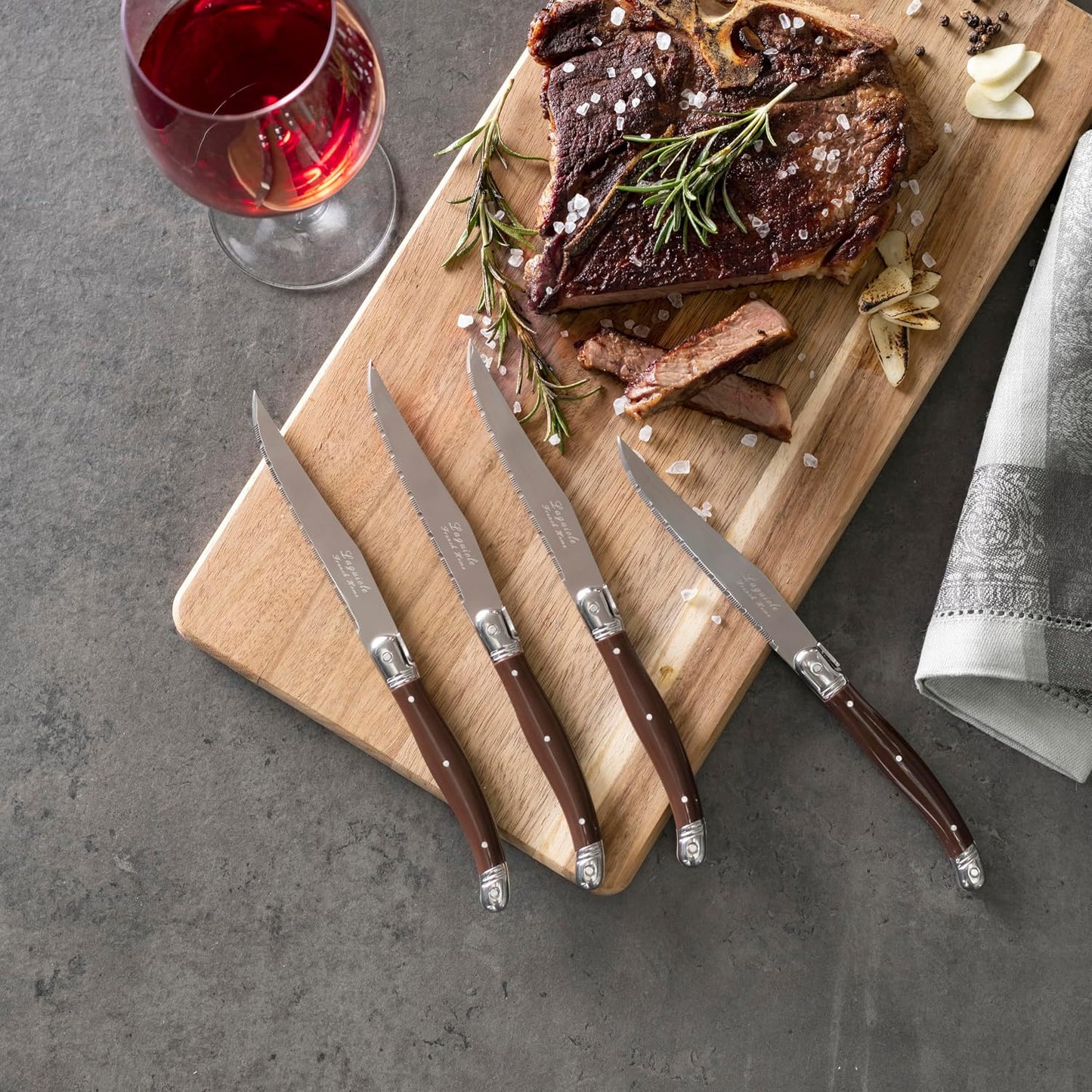 French Home Laguiole 4-Piece Steak Knife Set – Sophisticated Stainless Steel Dinner Knives with Navy Blue Handles & Iconic Bee Emblem – Serrated Knives for Smooth Cutting (9.25")