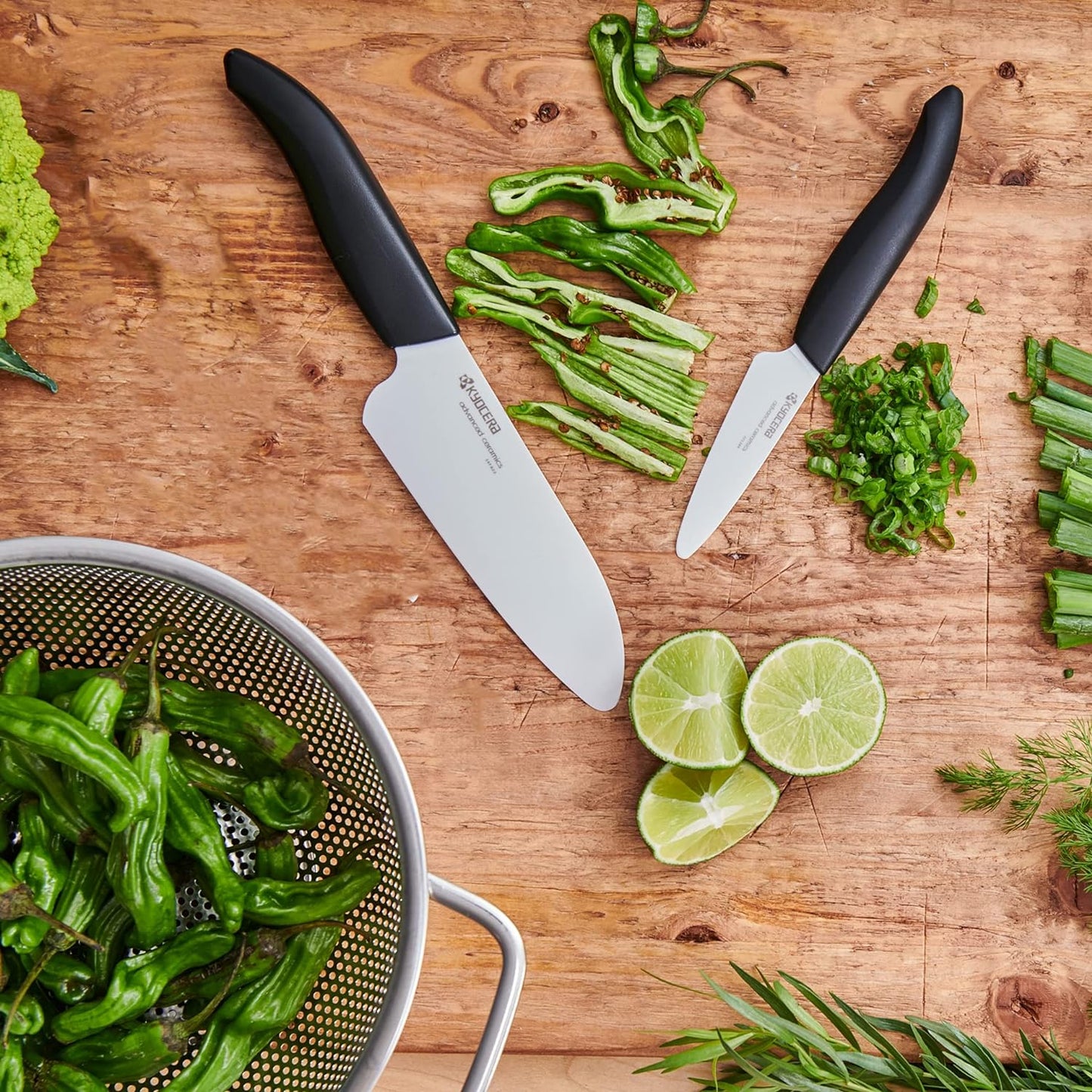 Kyocera’s Revolution 4-Piece Ceramic Knife Set: Ceramic Chef Knife For Your Cooking Needs, 7" Chef's Santoku, 5.5" Santoku, 4.5" Utility & 3" Paring Knives, Black/White