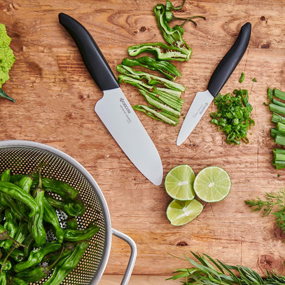 Kyocera’s Revolution 4-Piece Ceramic Knife Set: Ceramic Chef Knife For Your Cooking Needs, 7" Chef's Santoku, 5.5" Santoku, 4.5" Utility & 3" Paring Knives, Black/White