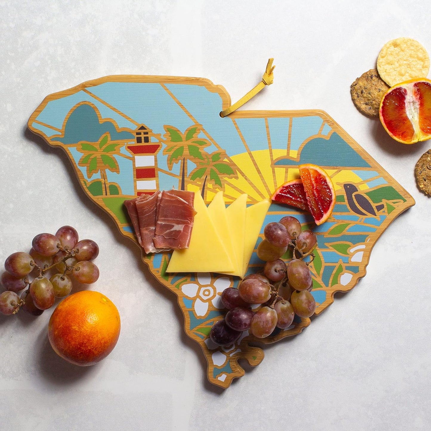 Totally Bamboo North Carolina State Shaped Cutting Board and Charcuterie Serving Platter with Artwork by Summer Stokes, Includes Hang Tie for Wall Display 18" x 8" x 5/8" - Colors A
