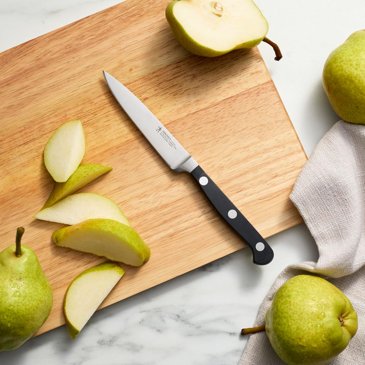 Classic 4-Inch Paring Knife, Razor-Sharp, German Engineered | Fully Forged Construction Provides Balance with Traditional Triple-Rivet Handles Enables Comfortable Easy Cutting.