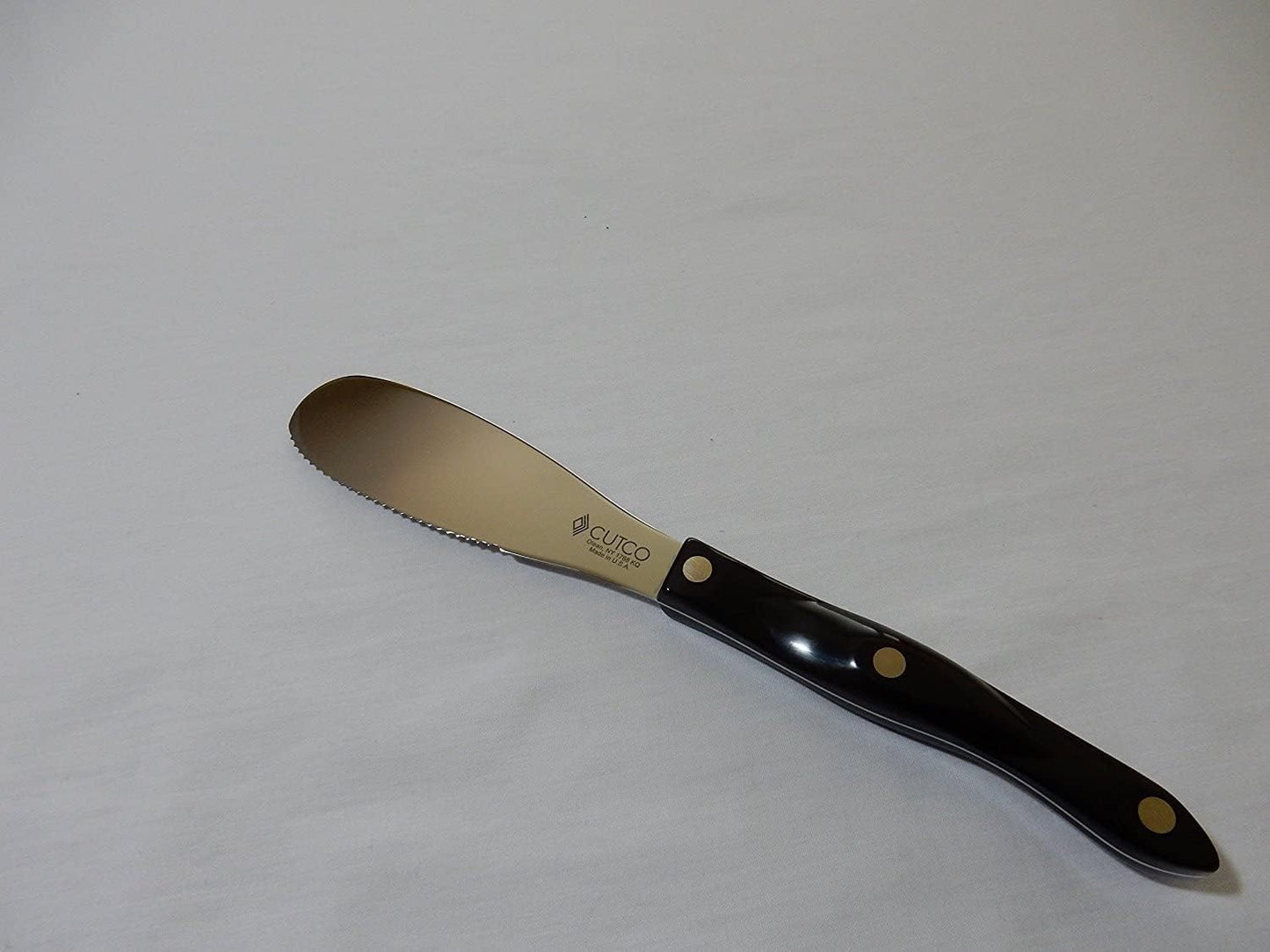 Model 1768 Spatula Spreader. . . . . 4.9" Double-D® serrated edge blade..............5.1" Highly engineered thermo-resin handle in Classic Brown (sometimes called Black).