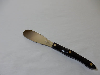 Model 1768 Spatula Spreader. . . . . 4.9" Double-D® serrated edge blade..............5.1" Highly engineered thermo-resin handle in Classic Brown (sometimes called Black).