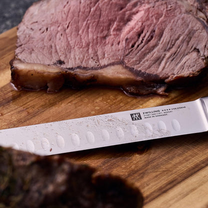 Four Star 10-inch Razor-Sharp German Hollow Edge Slicing Knife, Made in Company-Owned German Factory with Special Formula Steel perfected for almost 300 Years, Dishwasher Safe