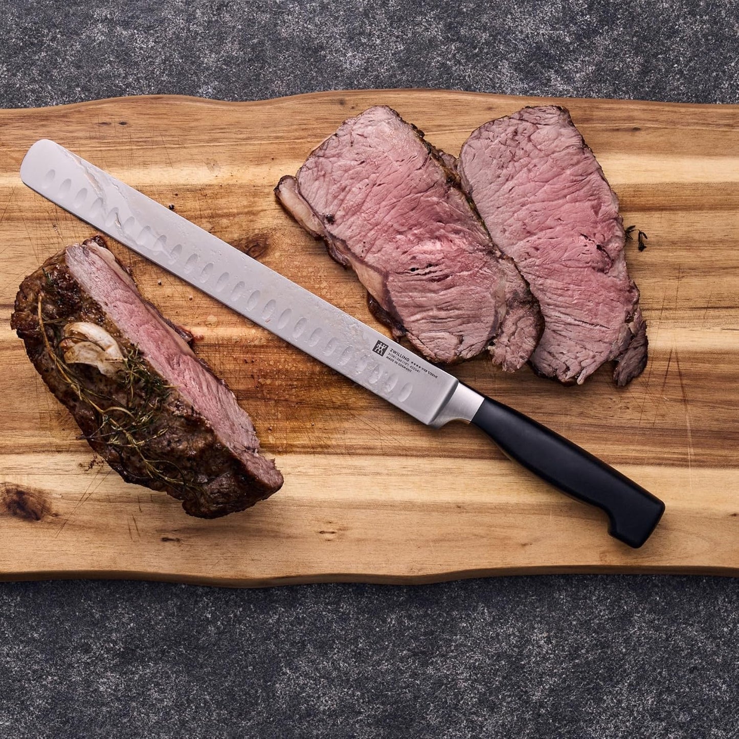 Four Star 10-inch Razor-Sharp German Hollow Edge Slicing Knife, Made in Company-Owned German Factory with Special Formula Steel perfected for almost 300 Years, Dishwasher Safe