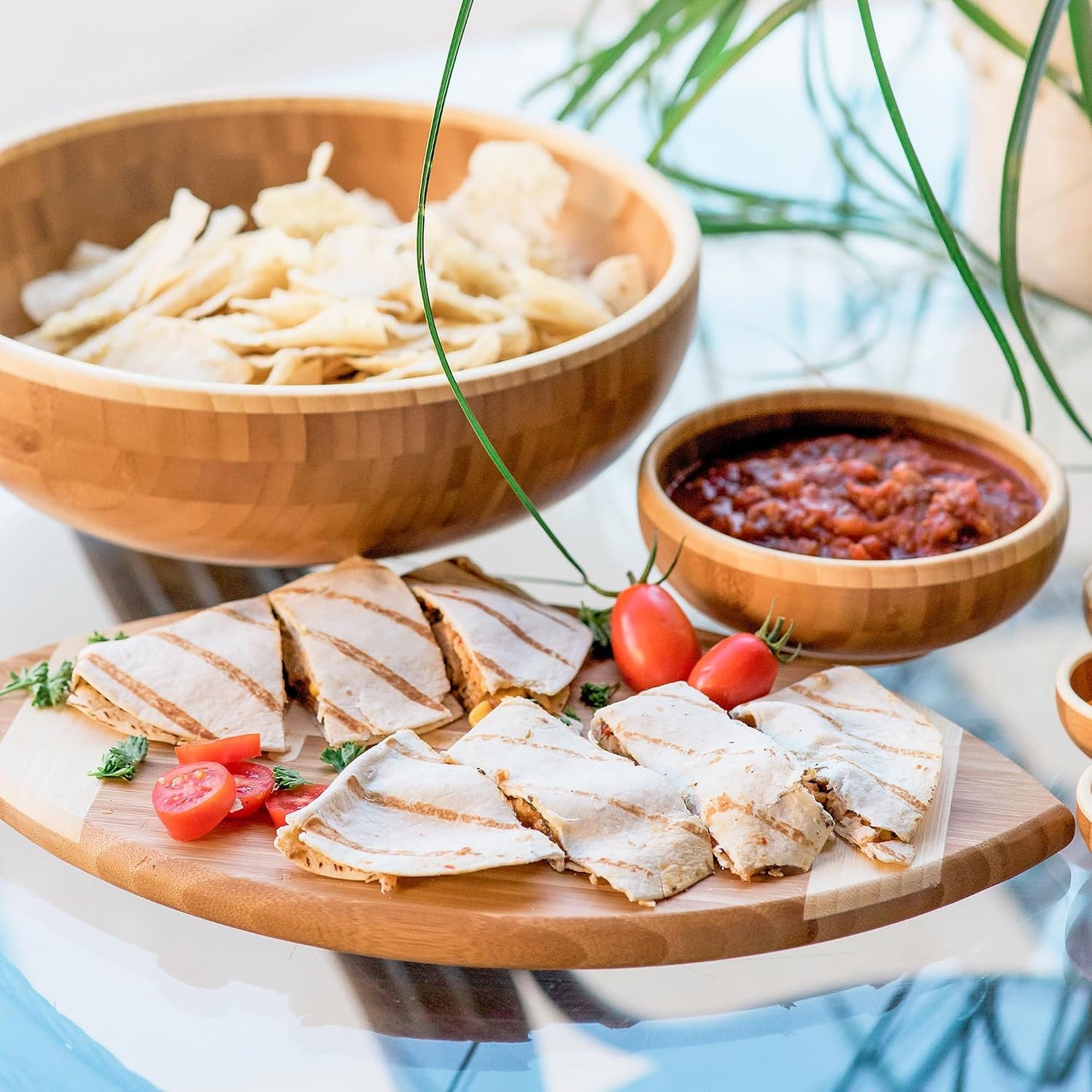 Football Shaped Bamboo Wood Cutting Board and Charcuterie Board, Great Gift for Football Fans | Football serving board for game day watch parties and tailgating. Smooth reverse side for prep. Hangs as decor between uses.