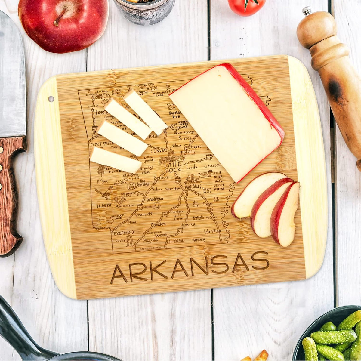 A Slice of Life New Jersey Engraved Map Cutting Board | 11” x 8.75” charcuterie board with engraved state map artwork. Smooth reverse side for food prep. Hang tie for wall display. - Colors B