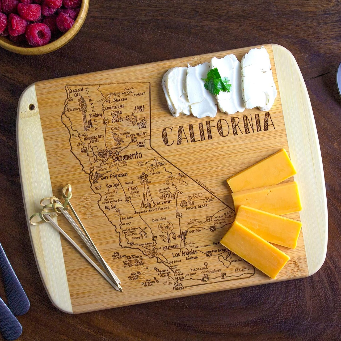 A Slice of Life New Jersey Engraved Map Cutting Board | 11” x 8.75” charcuterie board with engraved state map artwork. Smooth reverse side for food prep. Hang tie for wall display. - Colors B