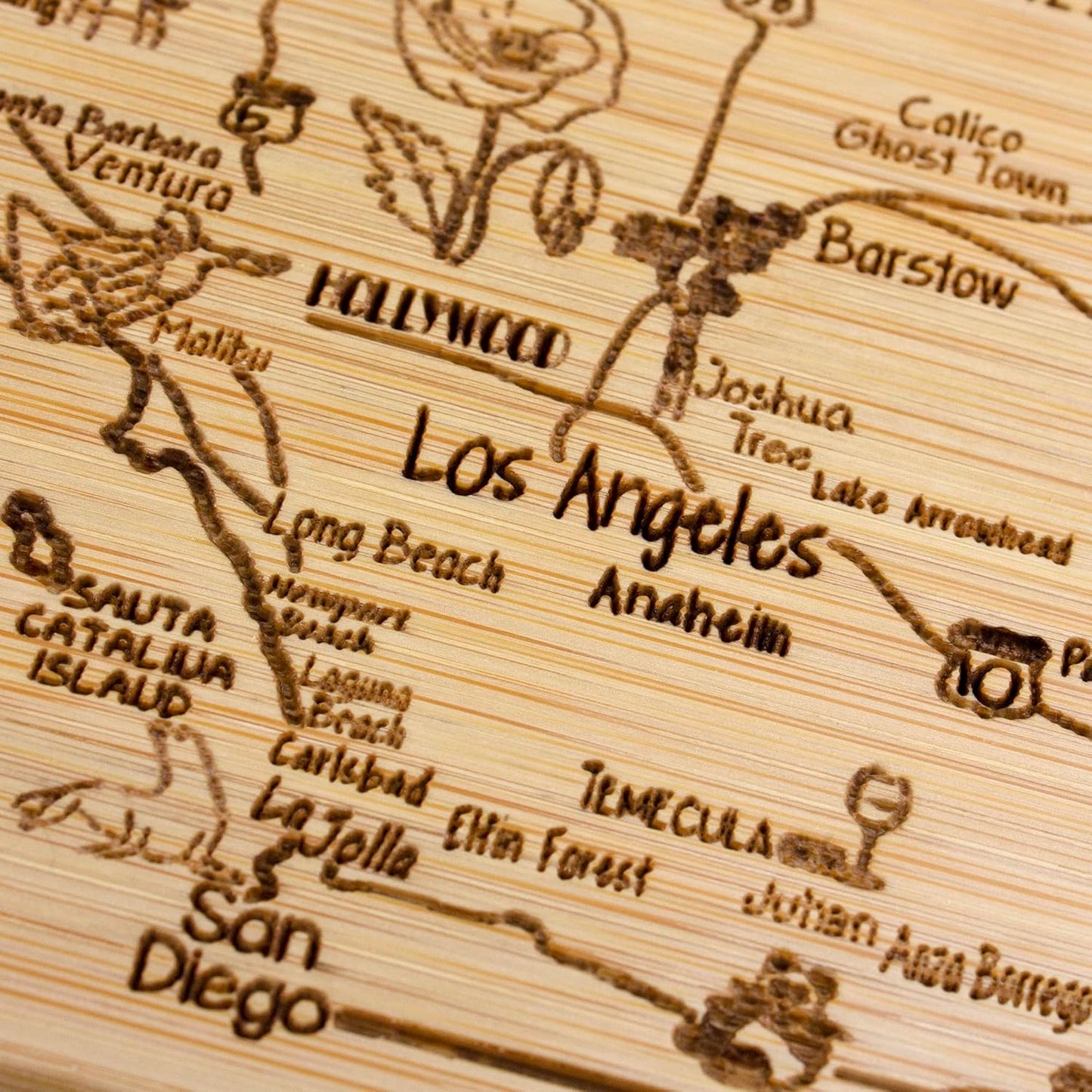 A Slice of Life New Jersey Engraved Map Cutting Board | 11” x 8.75” charcuterie board with engraved state map artwork. Smooth reverse side for food prep. Hang tie for wall display. - Colors B