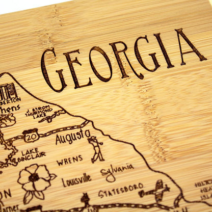 A Slice of Life New Jersey Engraved Map Cutting Board | 11” x 8.75” charcuterie board with engraved state map artwork. Smooth reverse side for food prep. Hang tie for wall display. - Colors B