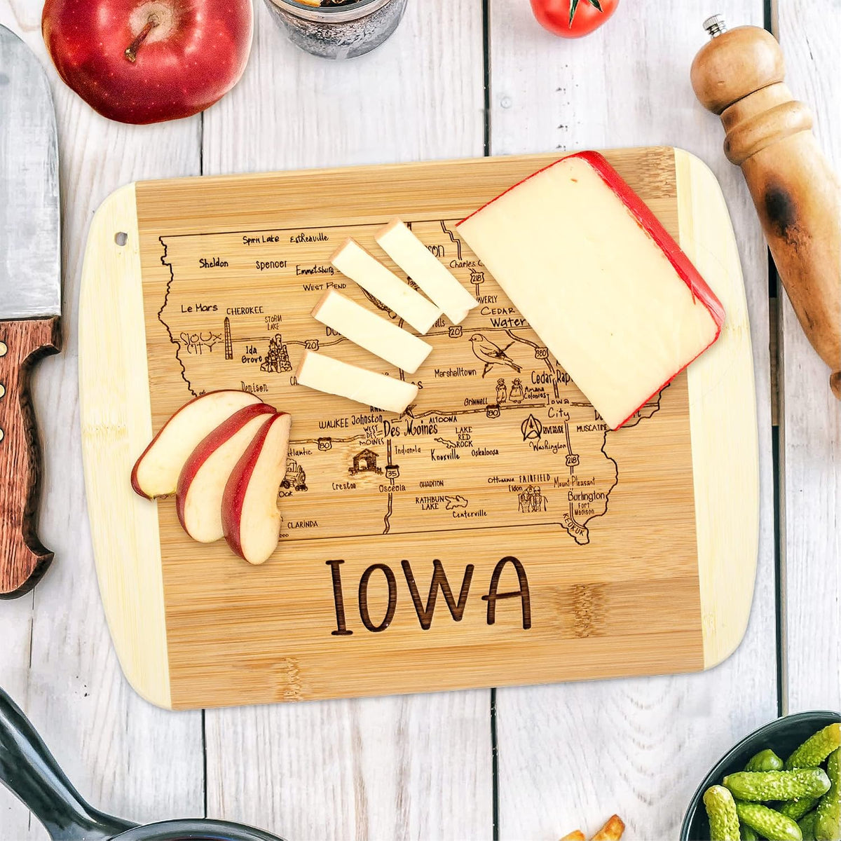 A Slice of Life New Jersey Engraved Map Cutting Board | 11” x 8.75” charcuterie board with engraved state map artwork. Smooth reverse side for food prep. Hang tie for wall display. - Colors B