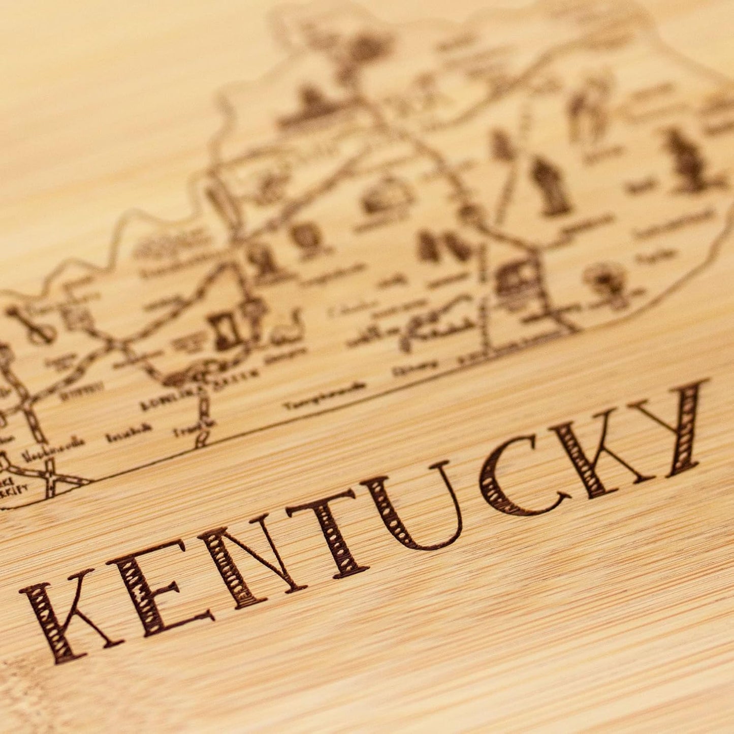 A Slice of Life New Jersey Engraved Map Cutting Board | 11” x 8.75” charcuterie board with engraved state map artwork. Smooth reverse side for food prep. Hang tie for wall display. - Colors B