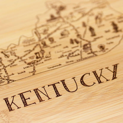 A Slice of Life New Jersey Engraved Map Cutting Board | 11” x 8.75” charcuterie board with engraved state map artwork. Smooth reverse side for food prep. Hang tie for wall display. - Colors B