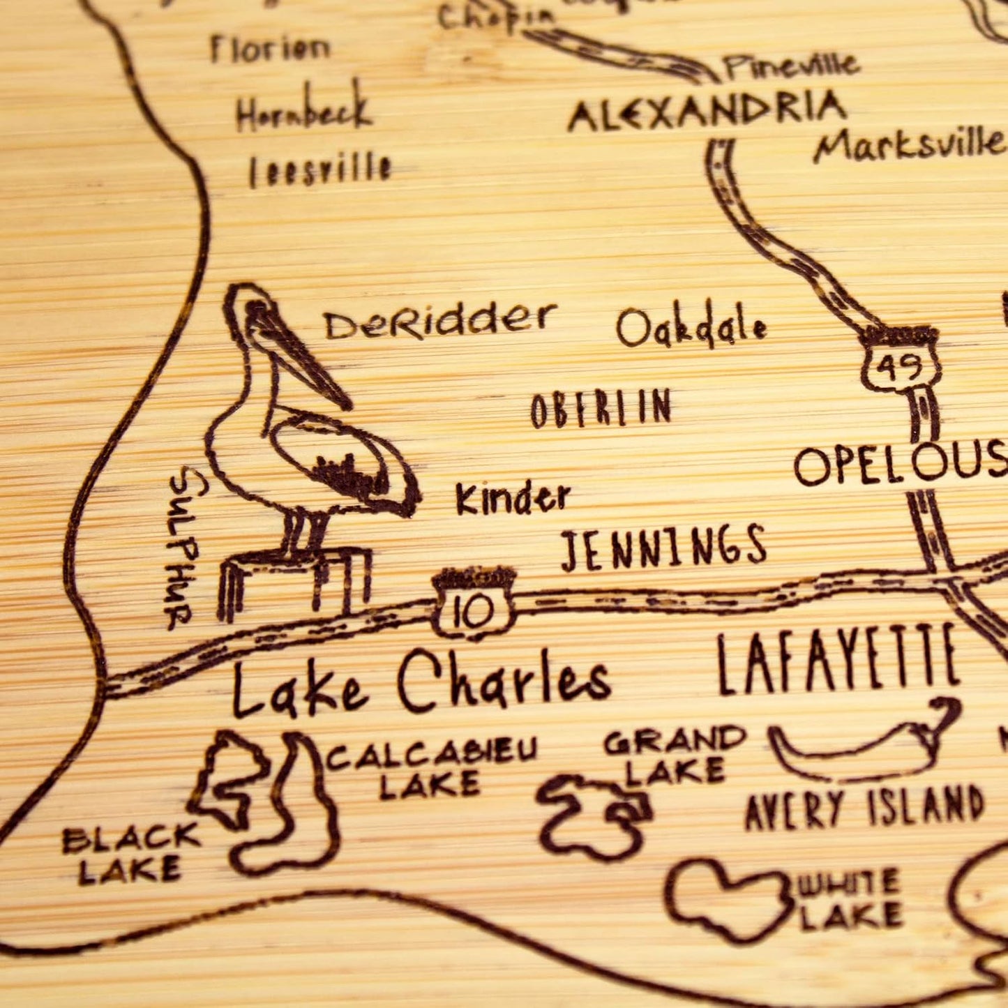 A Slice of Life New Jersey Engraved Map Cutting Board | 11” x 8.75” charcuterie board with engraved state map artwork. Smooth reverse side for food prep. Hang tie for wall display. - Colors B