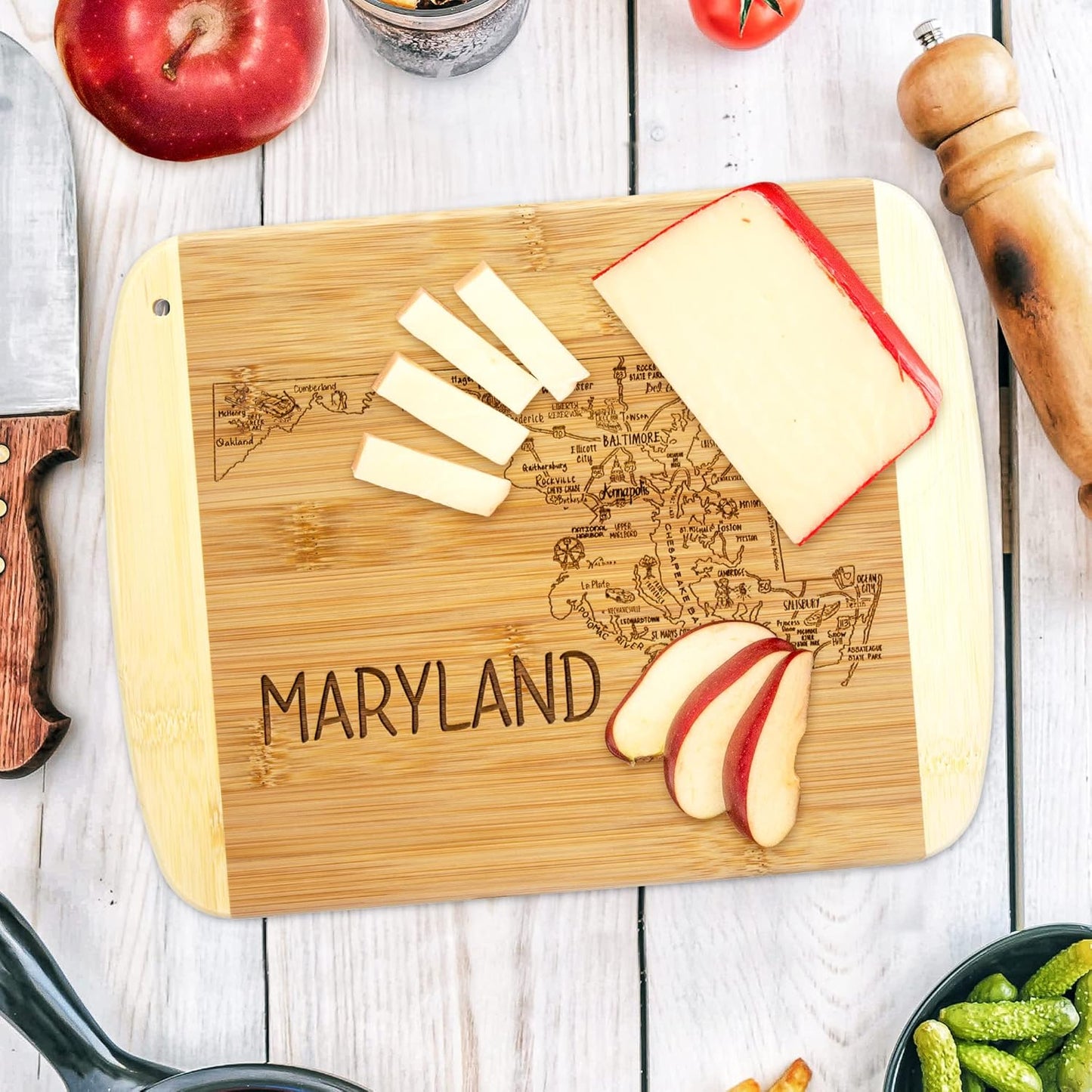 A Slice of Life New Jersey Engraved Map Cutting Board | 11” x 8.75” charcuterie board with engraved state map artwork. Smooth reverse side for food prep. Hang tie for wall display. - Colors B