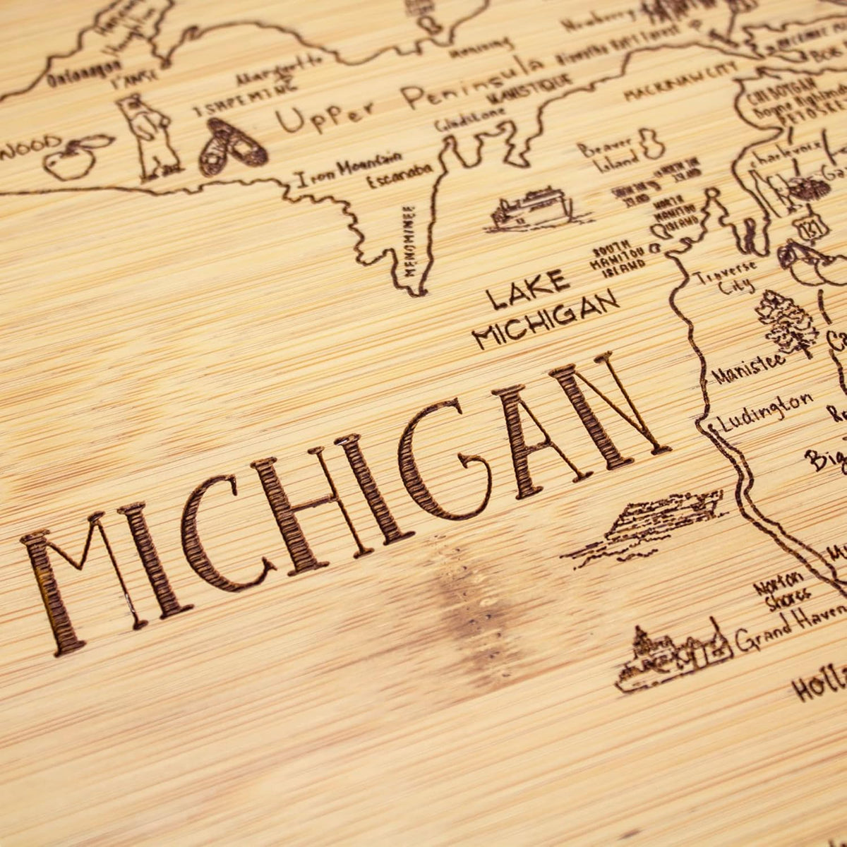 A Slice of Life New Jersey Engraved Map Cutting Board | 11” x 8.75” charcuterie board with engraved state map artwork. Smooth reverse side for food prep. Hang tie for wall display. - Colors B